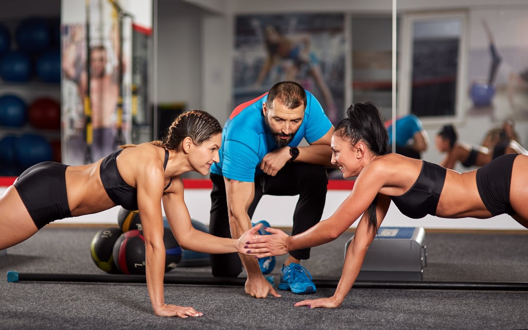 Fitness Coach and Girls Doing Workout